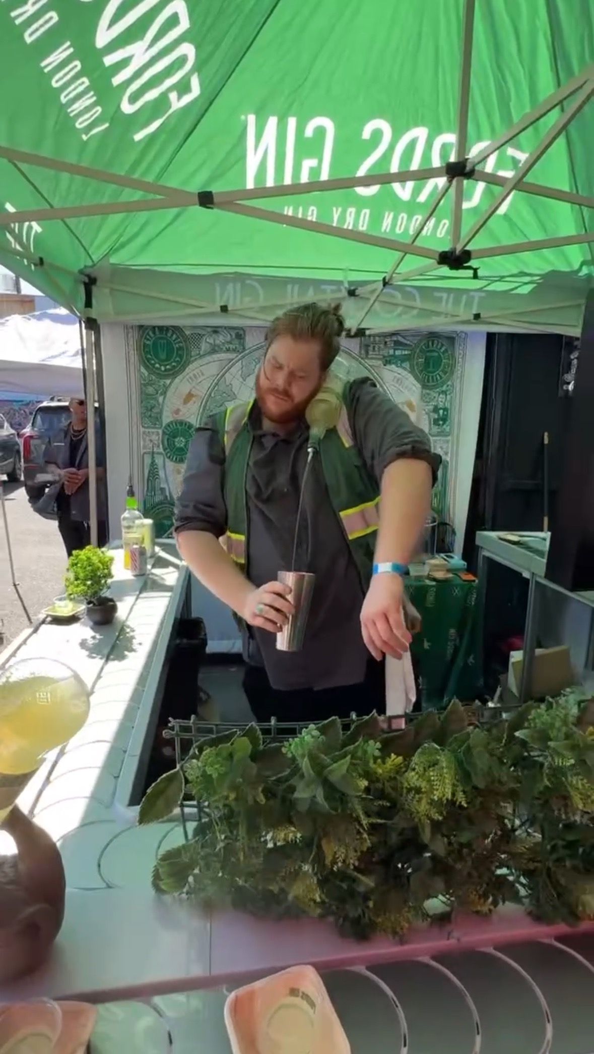 An image of a bartender making a drink.