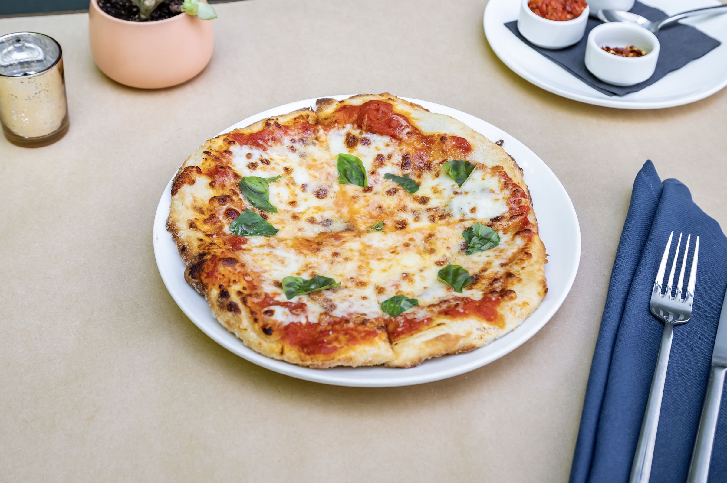 An image of a pizza from L’Antica Pizzeria Da Michele.