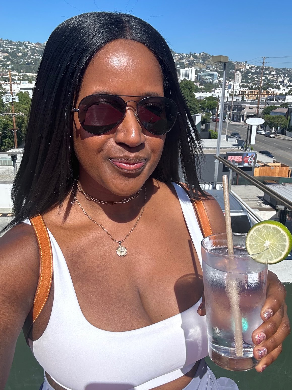 An image of lifestyle blogger Ariel on the WeHo rooftop at E.P. & L.P.