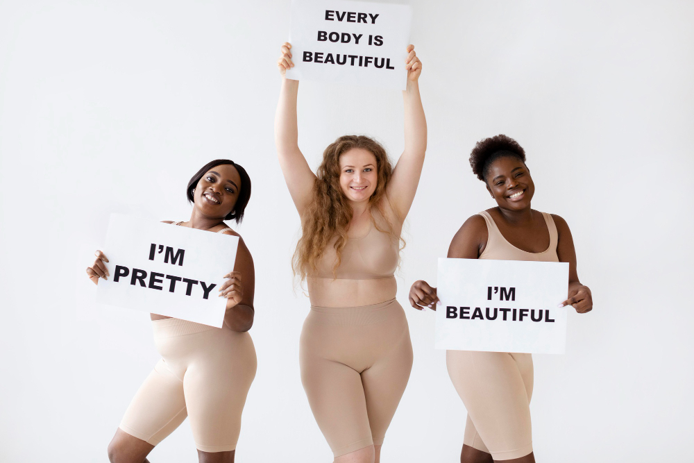 An image of 3 women showing off their confidence.