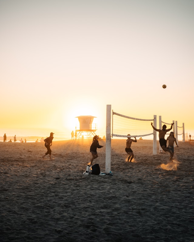 An image of people doing free things in LA, beach volleyball.