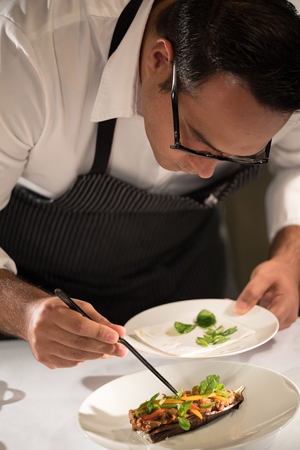 An image of a private chef plating a meal.