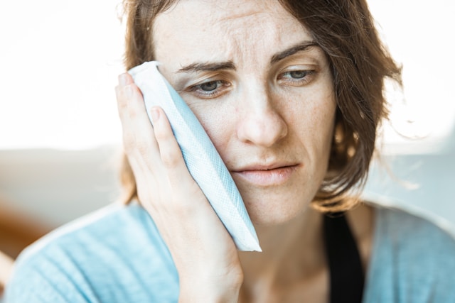 An image of a woman in pain.