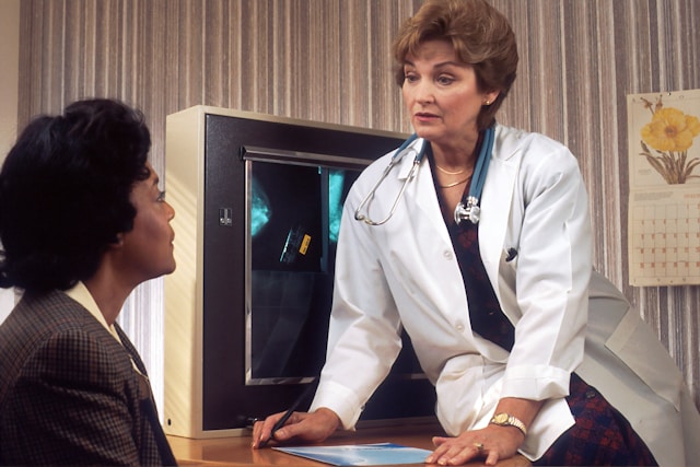 An image of a doctor and patient speaking.