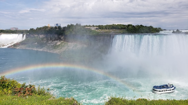 An image of Niagara Falls with a rainbow.