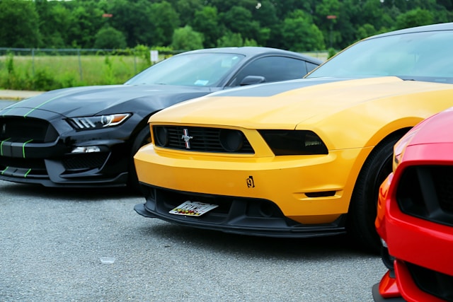 An image of a yellow Mustang sports car.