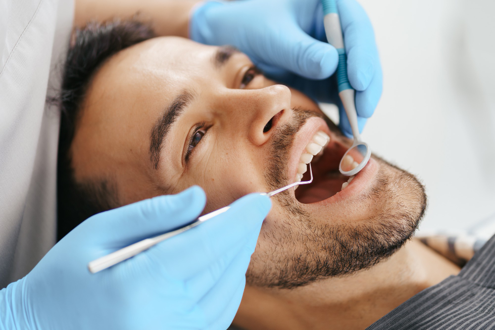 An image of a dentist examining a patient.