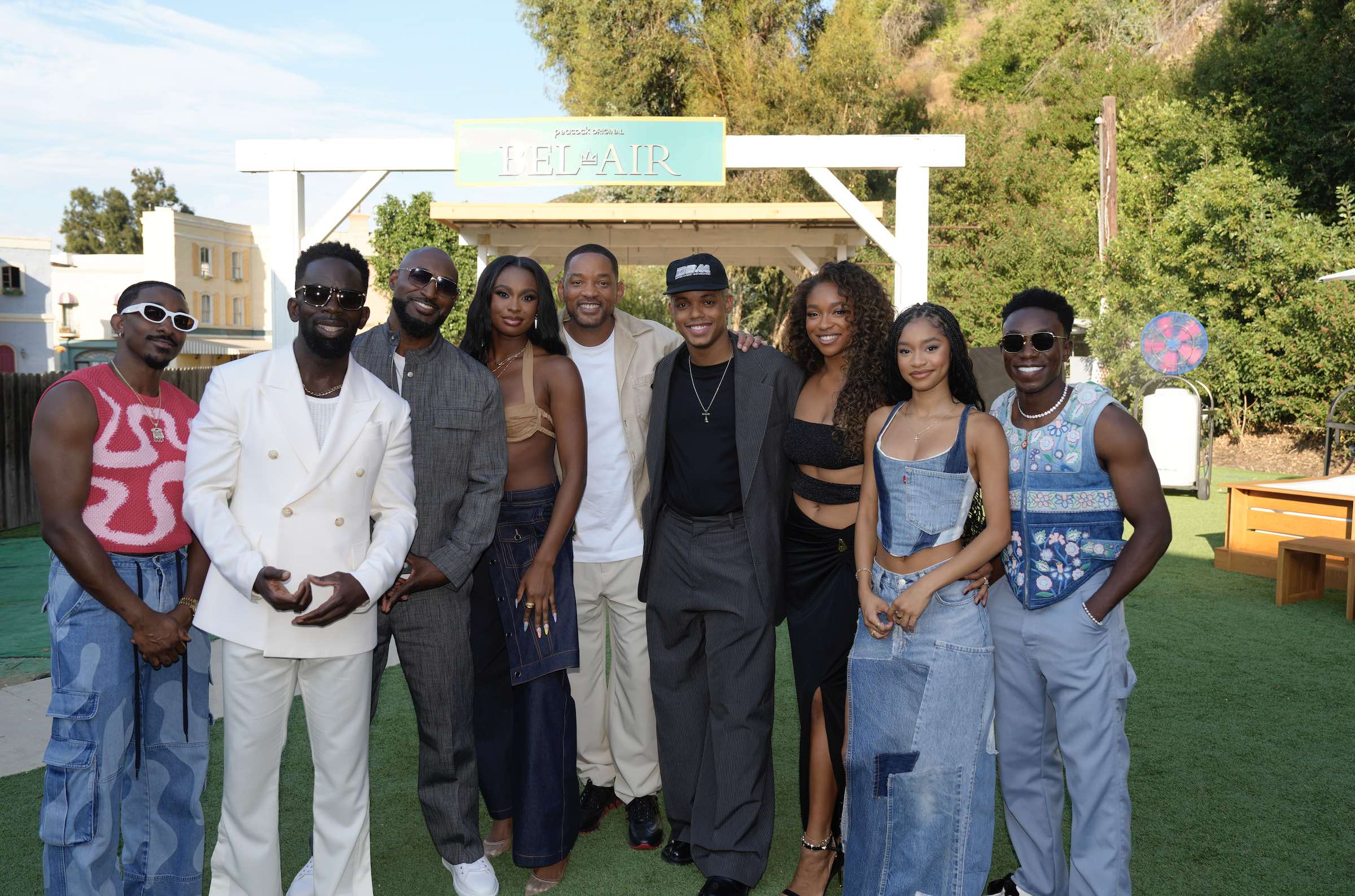 Photo of Will Smith with members of the cast of the third season of Bel Air.