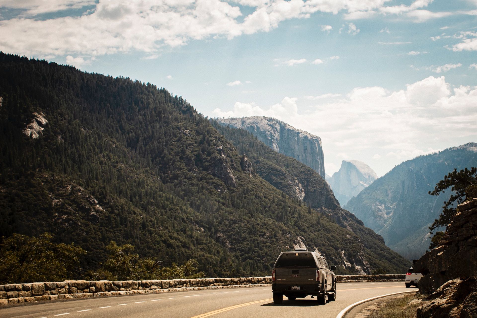 An image of a car on a road trip heading to a happy Labor Day weekend.