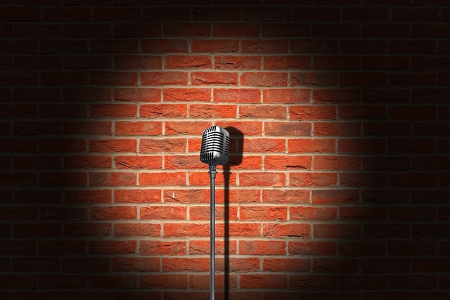 An image of a microphone and a stage.