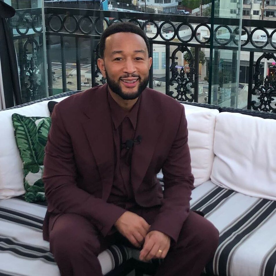 An image of John Legend at The London West Hollywood rooftop with his LVE wines.