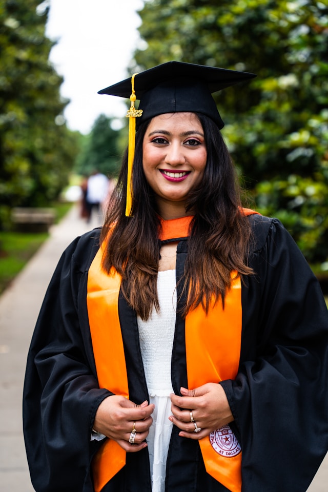 An image of a woman wearing a cap and gown.