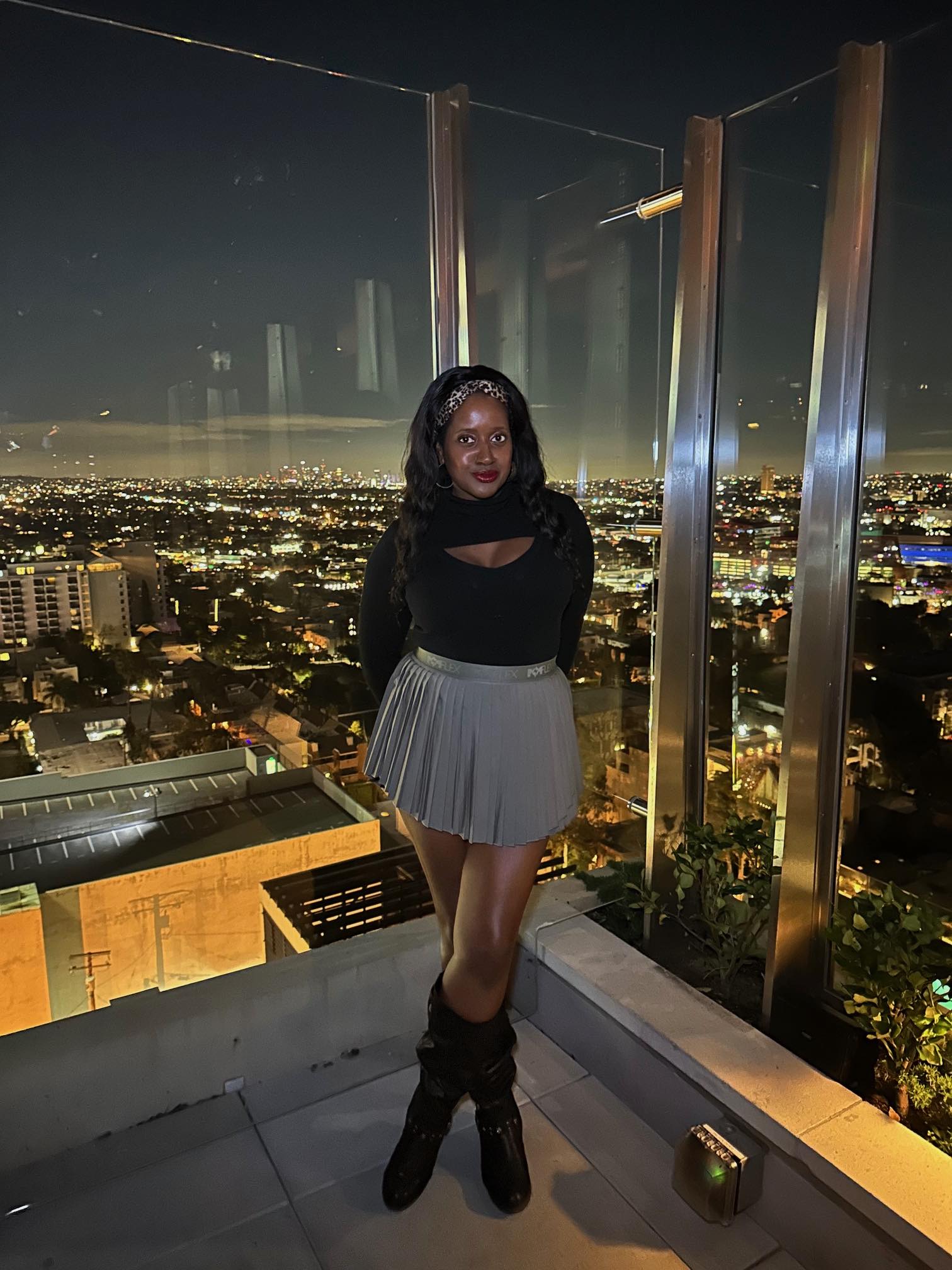 An image of lifestyle blogger Ariel at a rooftop bar in Los Angeles.