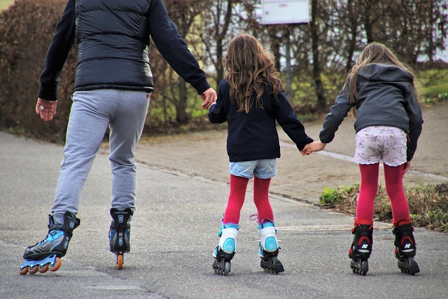 An image of three people rollerblading