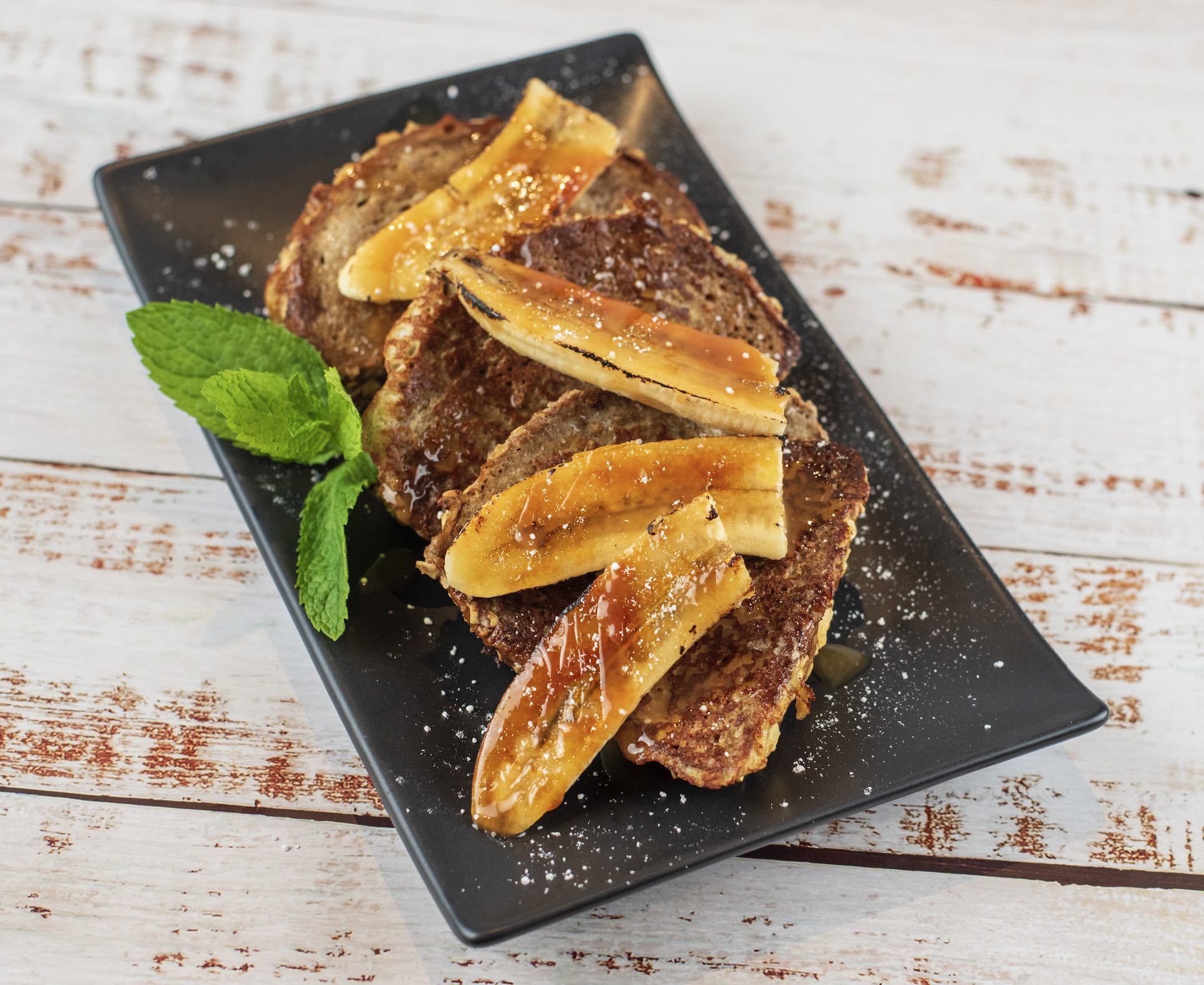 An image of the dessert from the Black Angus Brunch Experience - French Toast made with caramelized bananas.