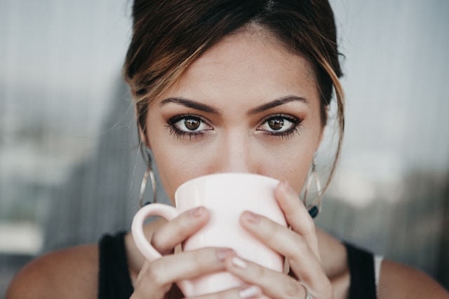 An image of someone drinking a cup of kava.