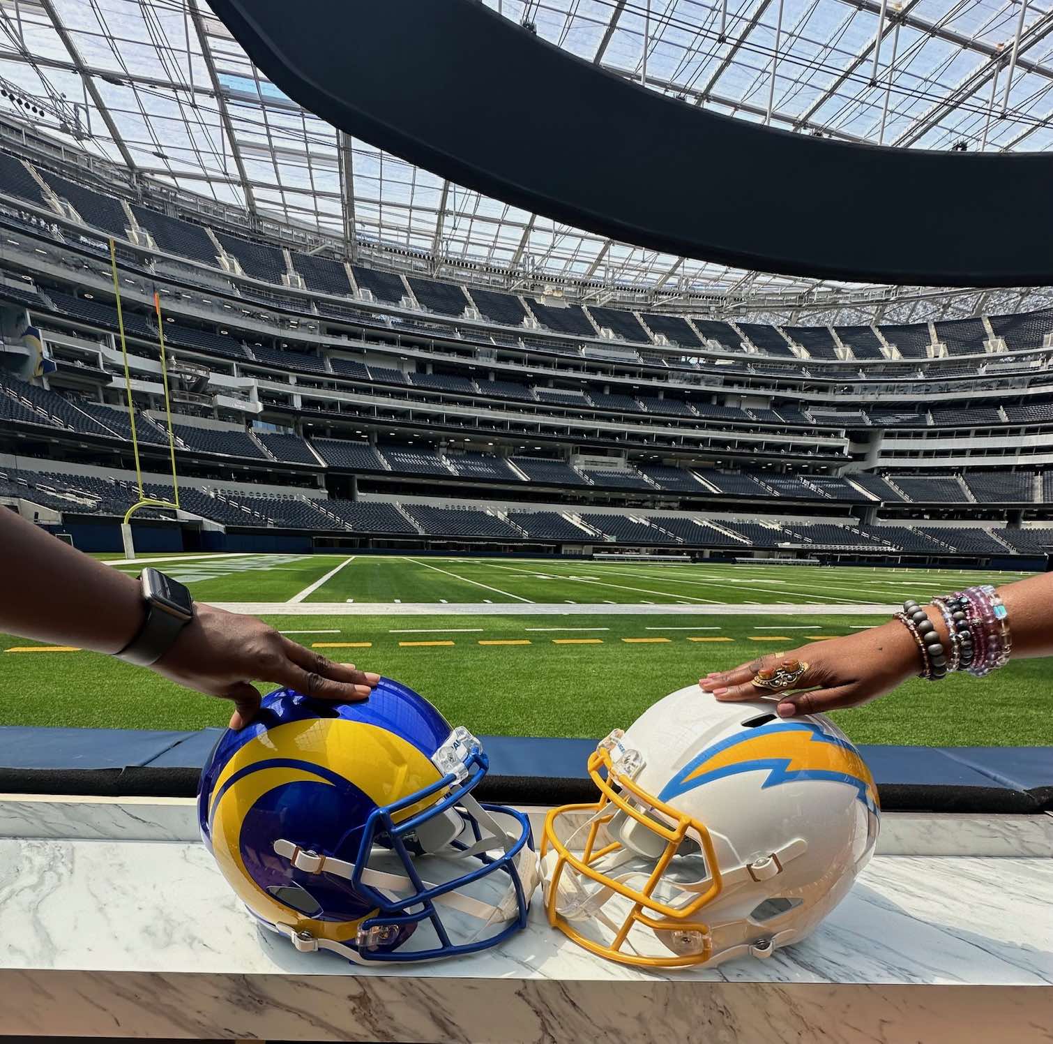 An image of a Rams and Chargers helmet at SoFi.