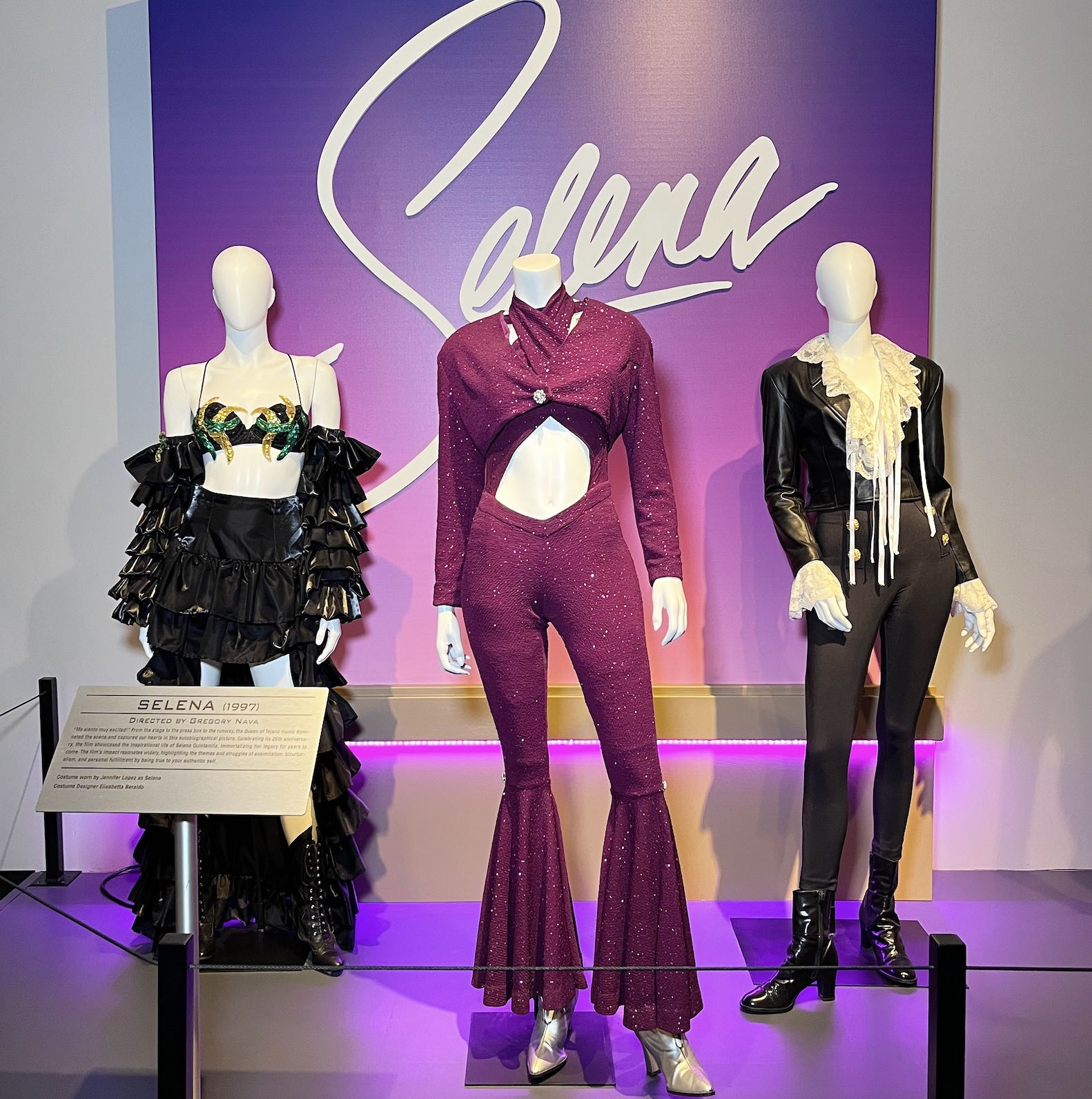 An image of the costumes from Selena at the Warner Bros. Tour.