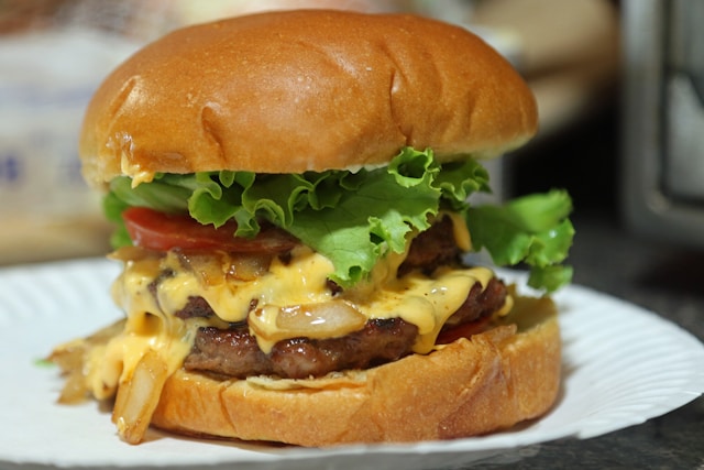 An image of a cheeseburger for the National Cheeseburger Day deals.