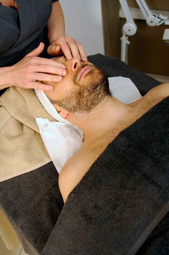 An image of a man getting a facial.