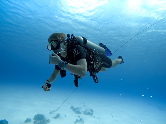 An image of a guy diving in Bonaire.