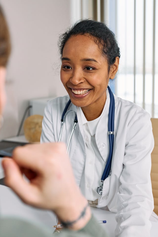 An image of a nurse practitioner with a patient.