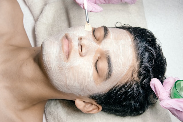 An image of a woman getting a facial.