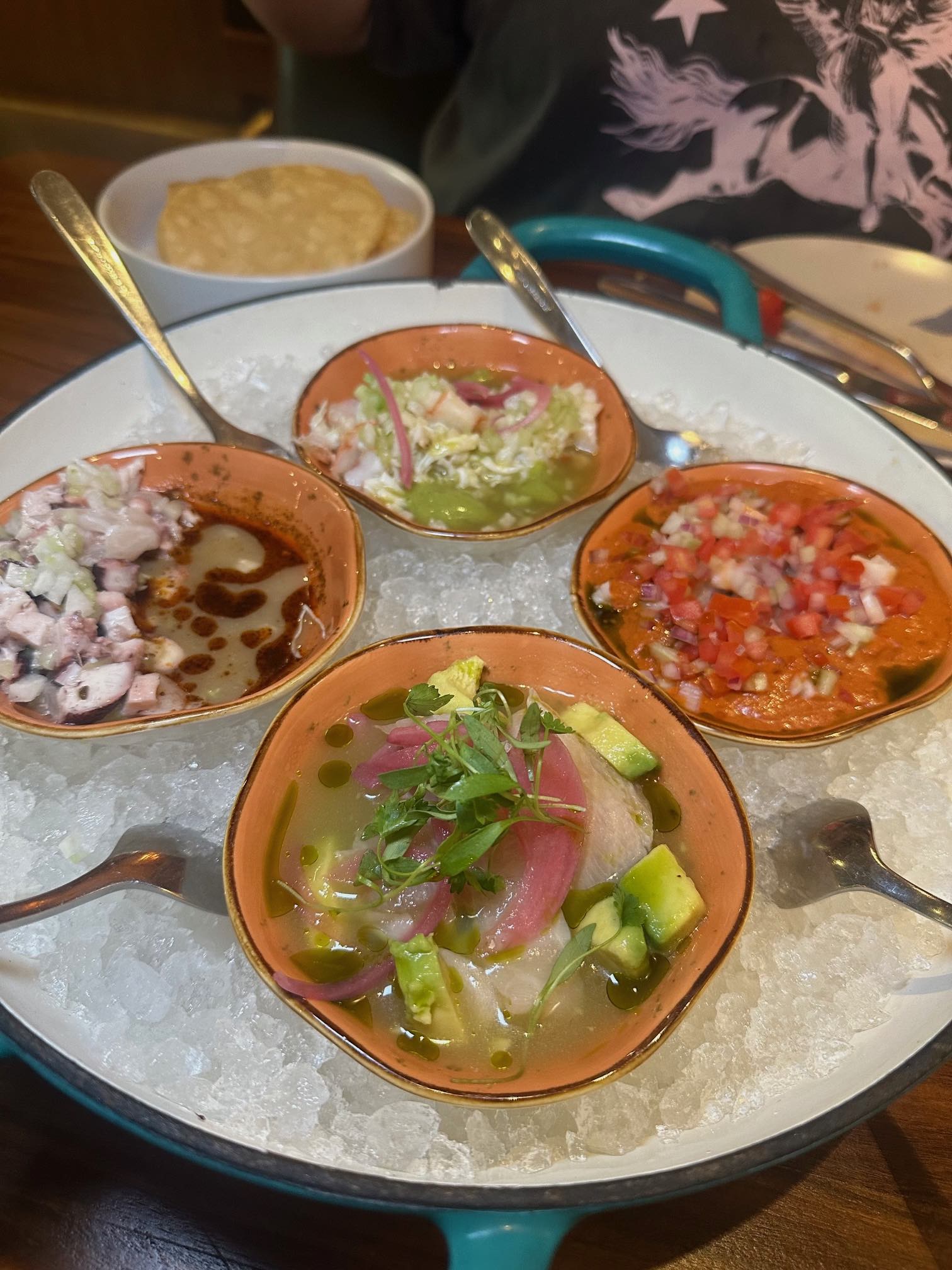 An image of the The Taste of Baja Ceviche - 4 signature ceviches: roja leche de tigre, aguachile, and kona kanpachi.