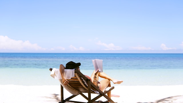 An image of a person relaxing on a beach.