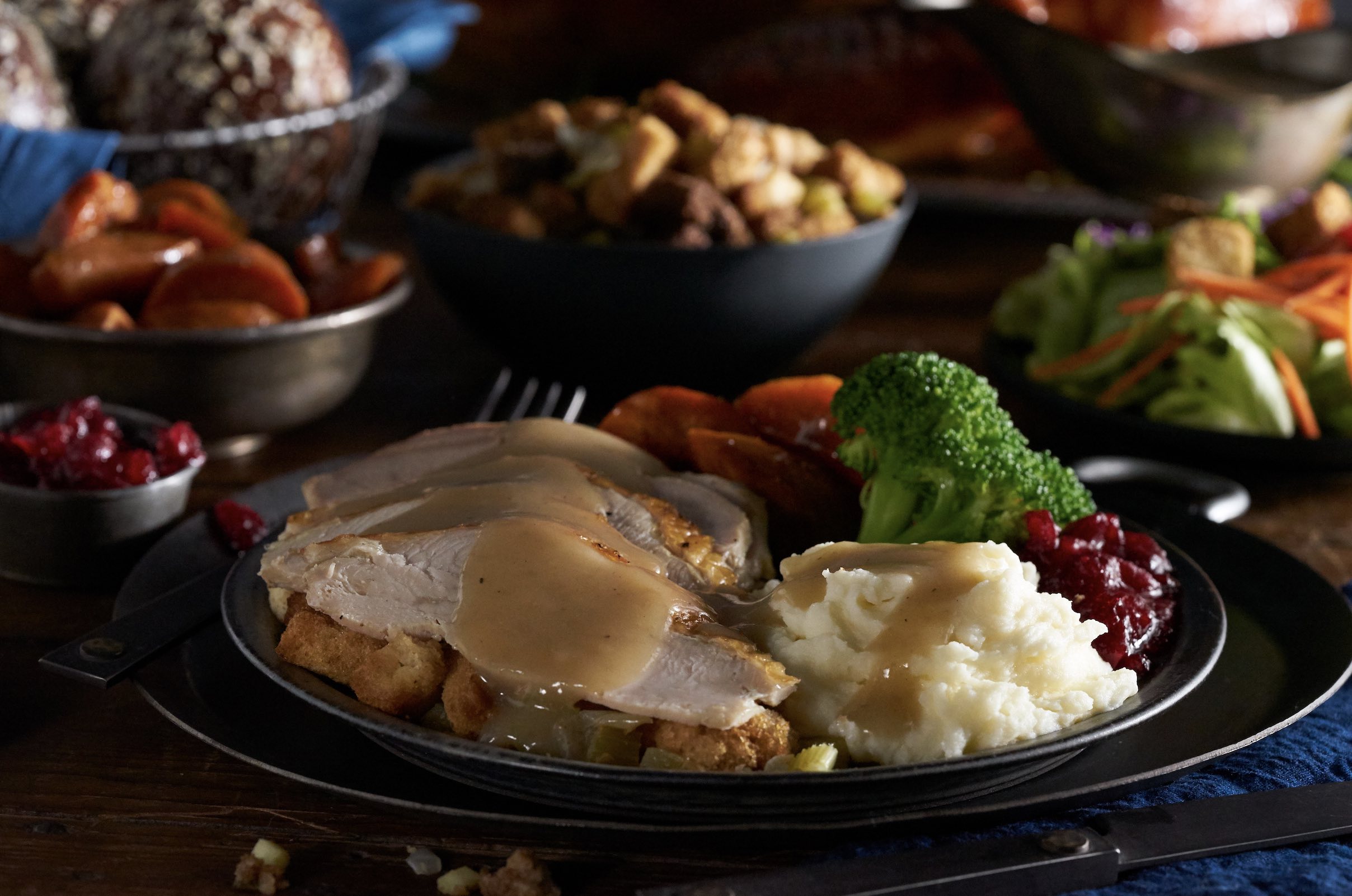 An image of a happy Thanksgiving spread from Black Angus.