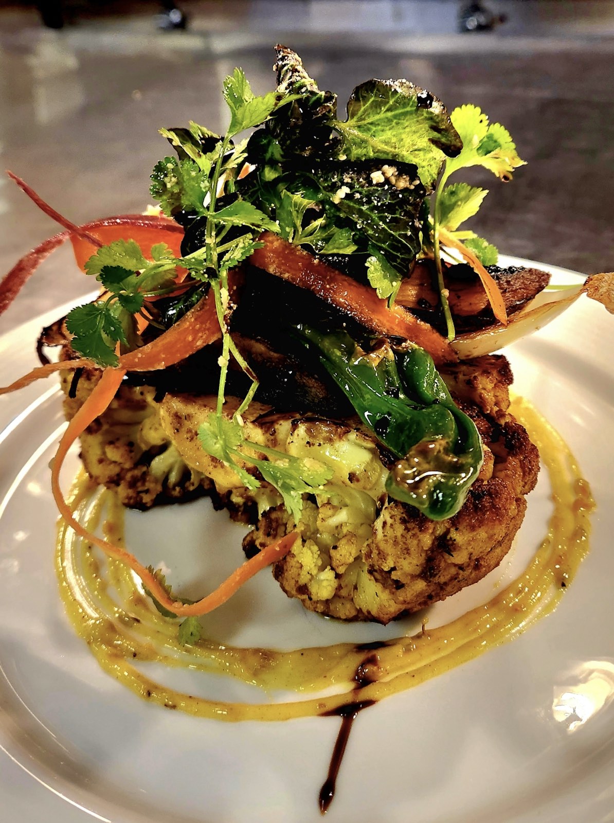 An image of the Tandoori-spiced Cauliflower Steak from Boxwood's Happy Thanksgiving meal.