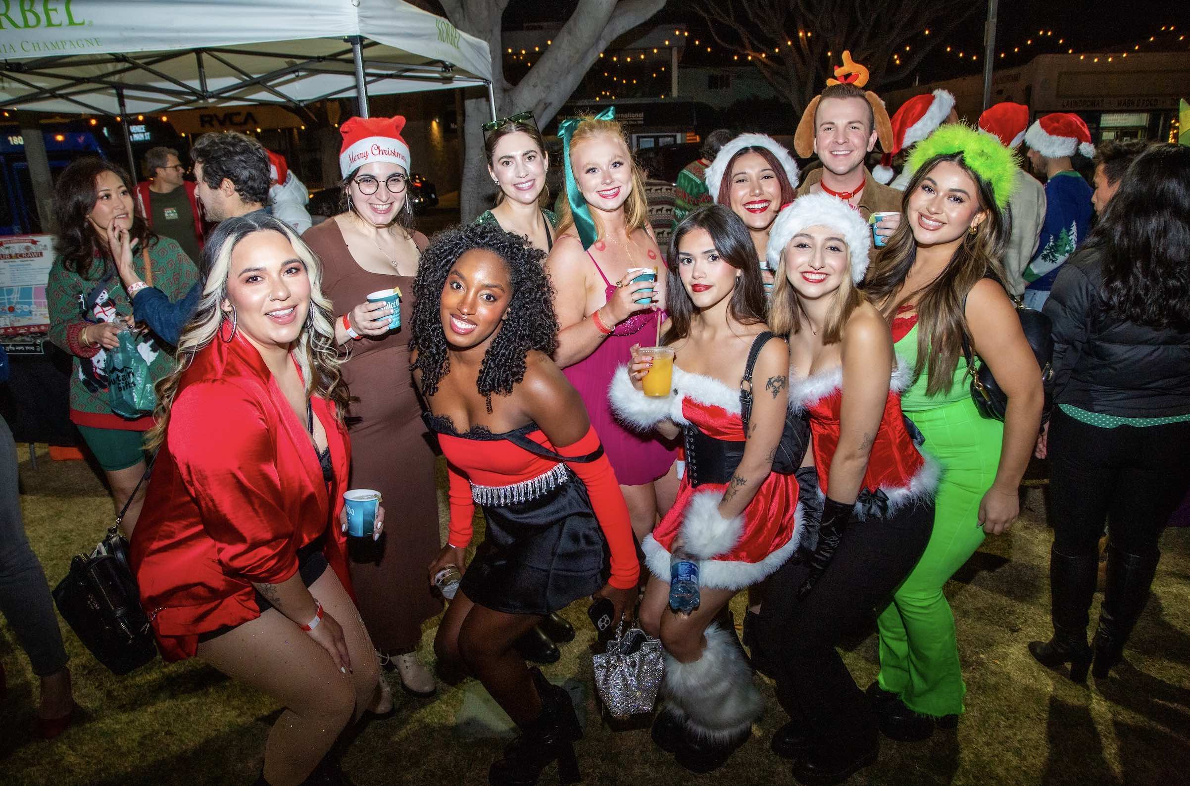 An image of people on a Santa bar crawl.