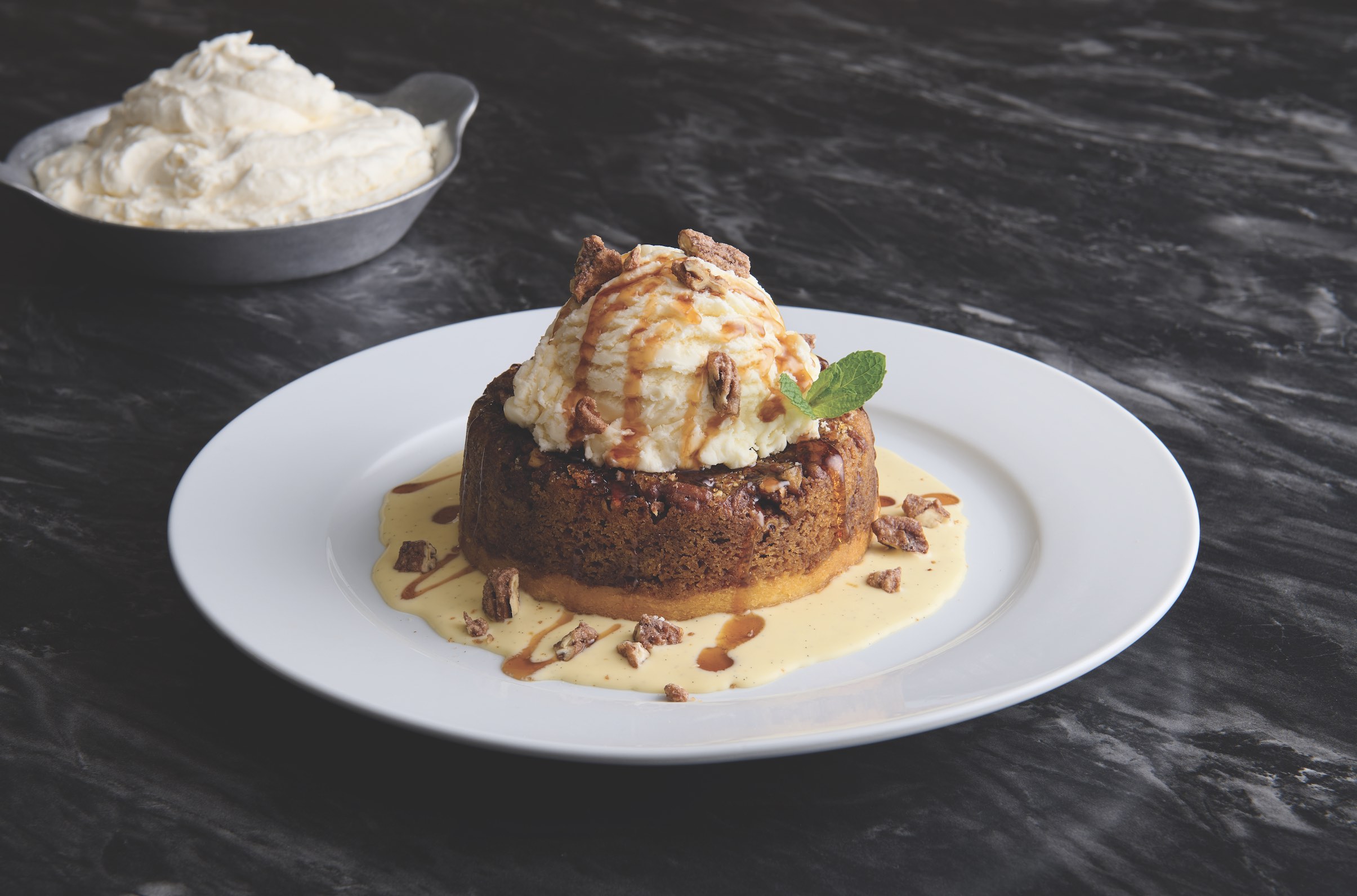 An image of Cinnamon + Pecan Butter Cake from Mastro's. Happy Holidays!