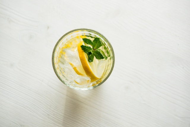 An image of a glass of water with lemon and mint. Merry Christmas and happy holidays! This will help you lose weight.