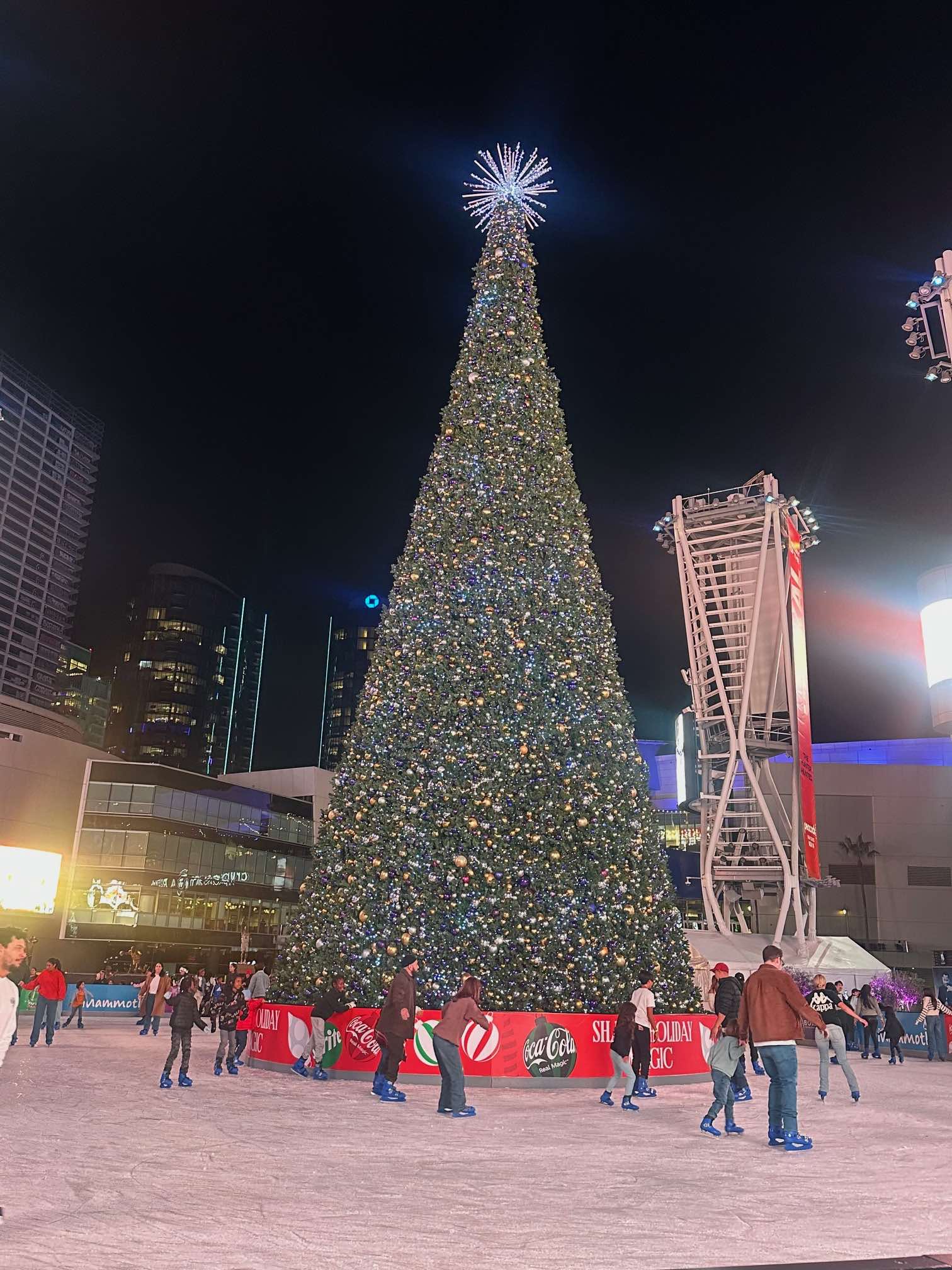 An image of a Christmas tree and ice skating rink in DTLA.