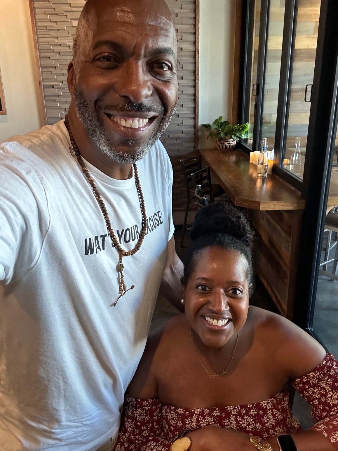 An image of Four-time NBA champion John Salley and lifestyle blogger Ariel Johns.