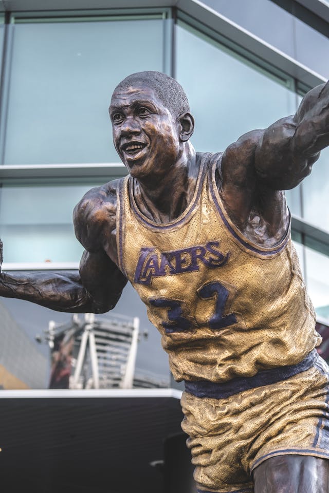 An image of a Magic Johnson statue located outside Crypto.com Arena.