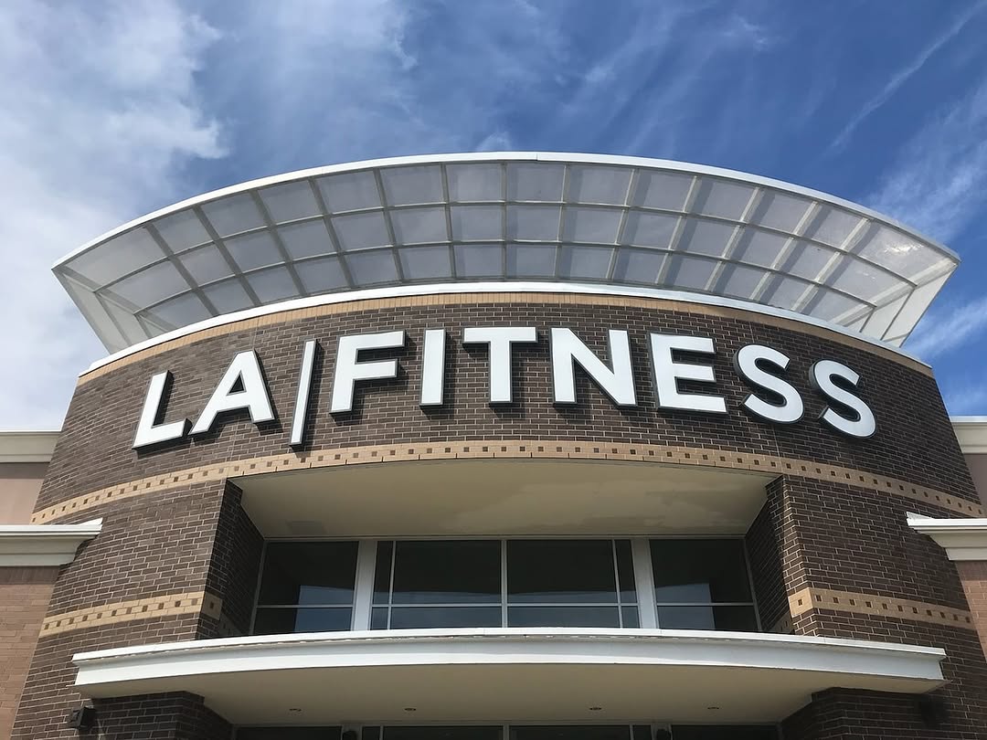 An image of an LA Fitness where they offer chair yoga for seniors.