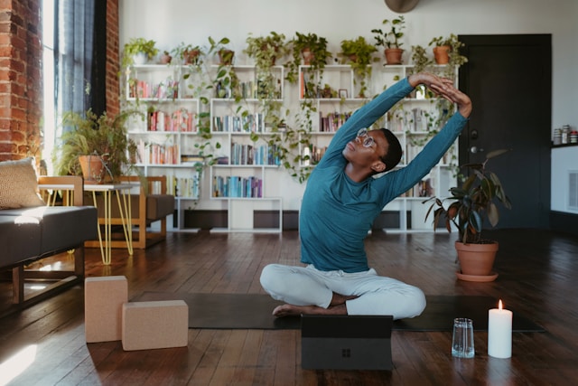 An image of a person doing an at-home yoga class.