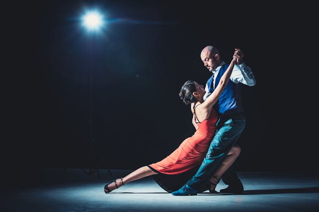 An image of two people salsa dancing.