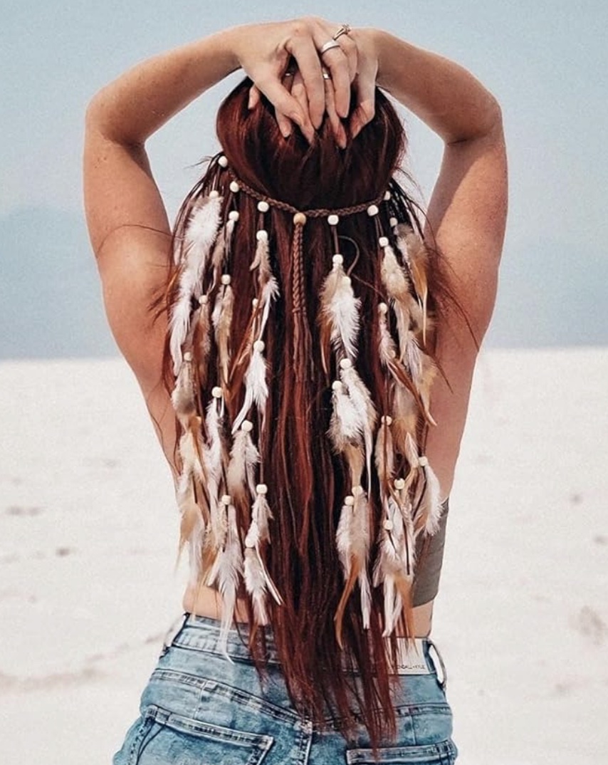 An image of someone wearing a Bohemian Feather Hairband Gypsy Headband.