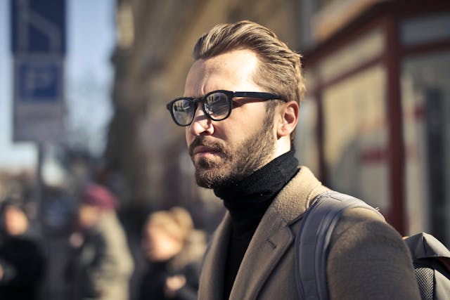 An image of a man wearing glasses.