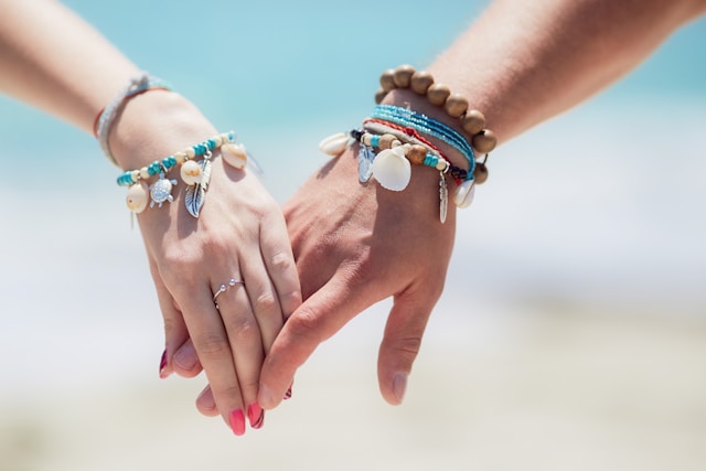 An image of someone wearing seashell jewelry.