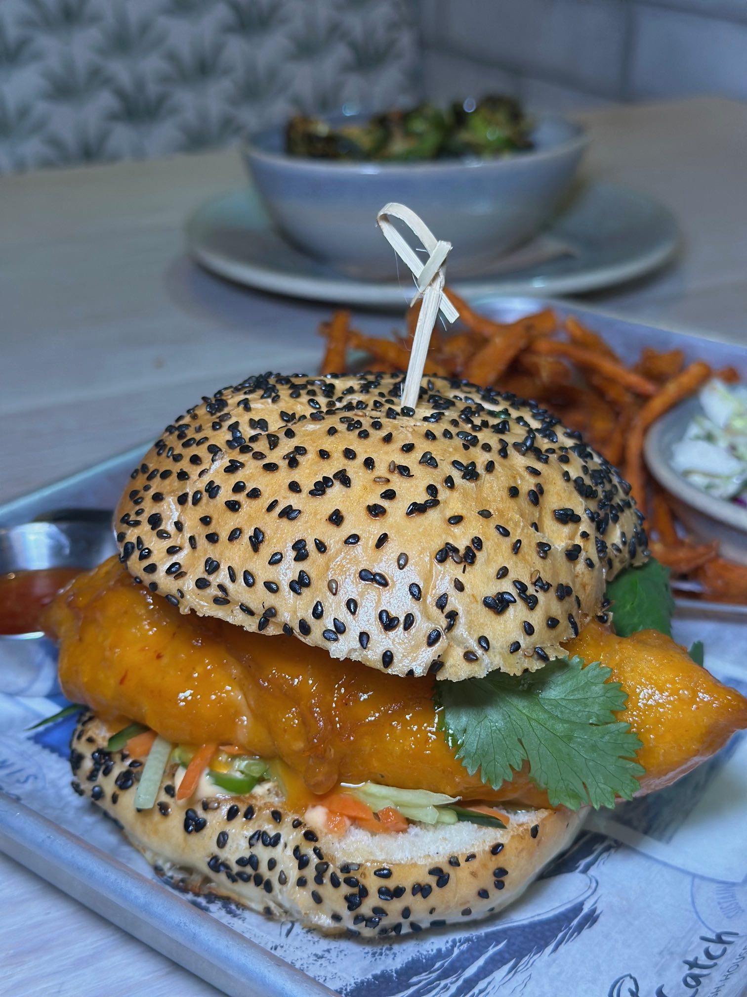 An image of the Hot Fish Burger, some of the best seafood near me at Pacific Catch.