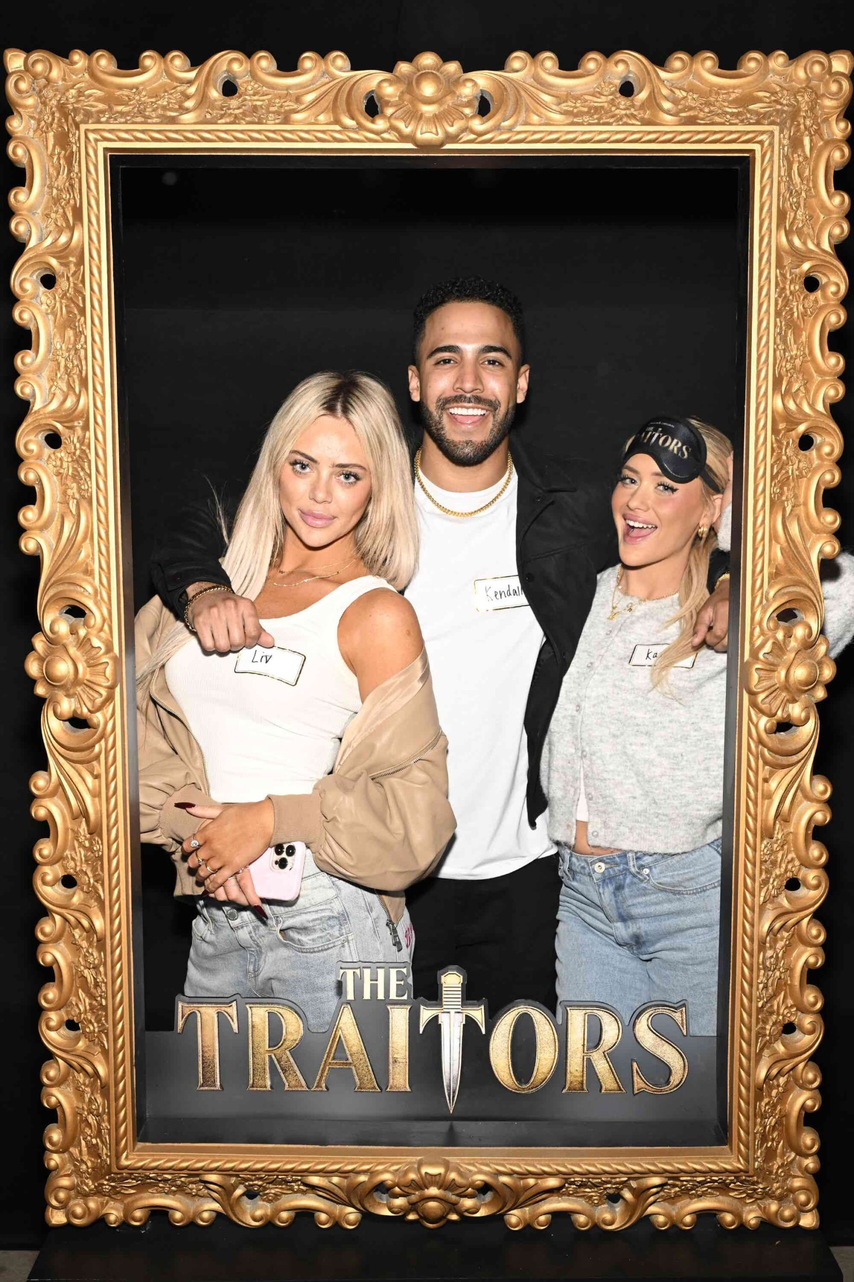 An image of Love Island Islanders Liv Walker (l), Kendall Washington (m) and Kaylor Martin (r) attend The Traitors VIP Experience.