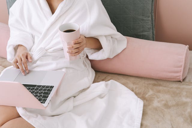 An image of a woman wearing a long bathrobe.