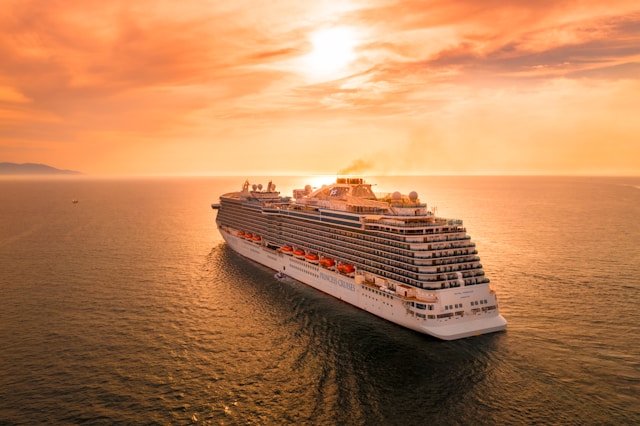 An image of a cruise ship sailing.