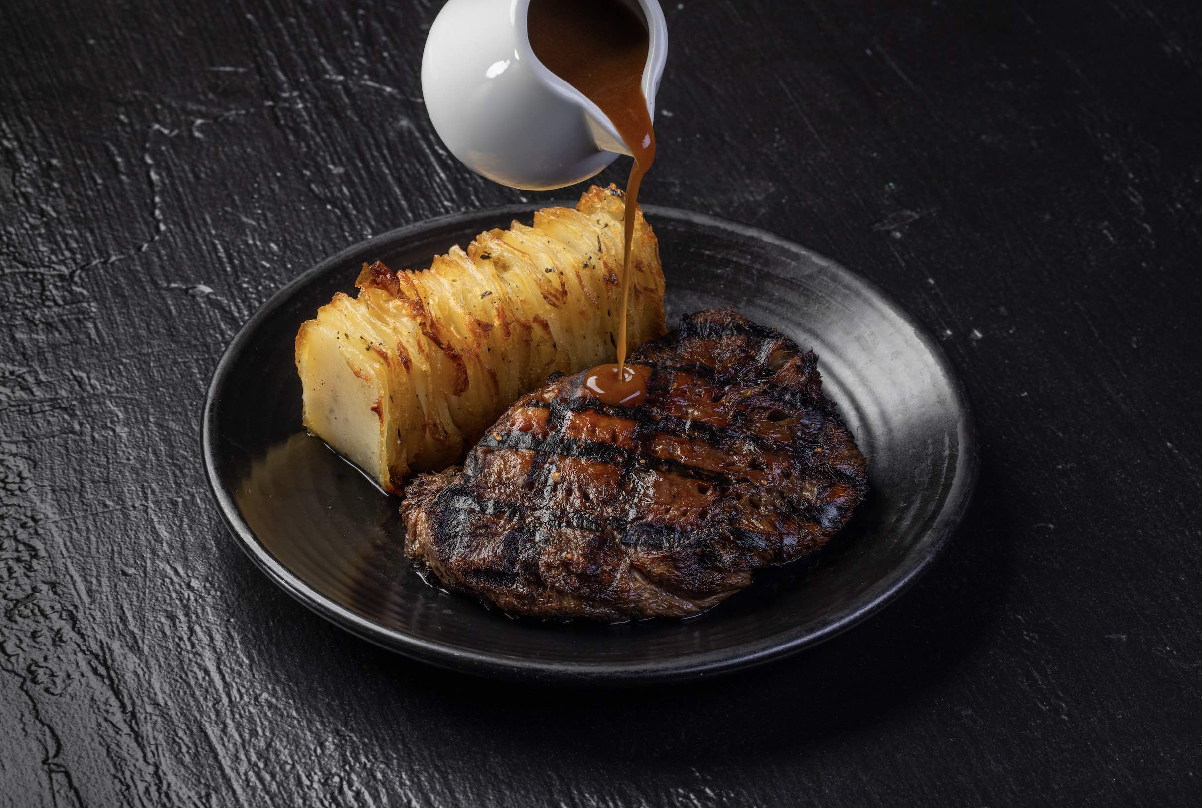 An image of the Lion’s Mane Steak with whipped potatoes and bordelaise at Crossroads.