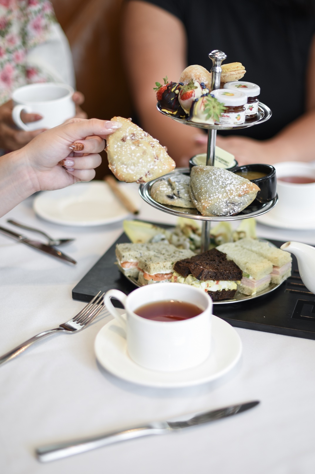 An image of tea and bites at the Afternoon Tea at the Godfrey Hotel.