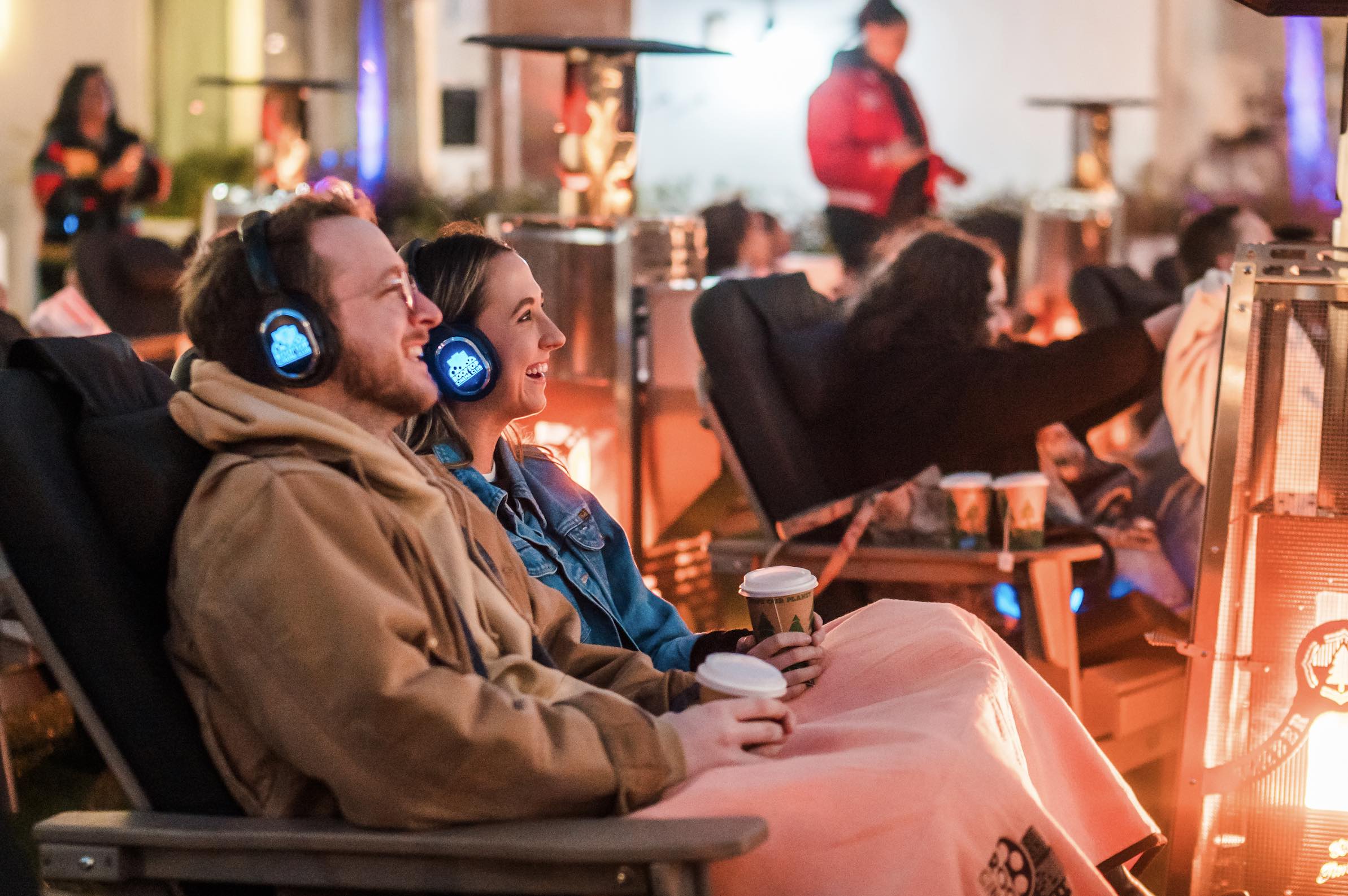 An image of a couple at Fireside Films series at Rooftop Cinema Club.